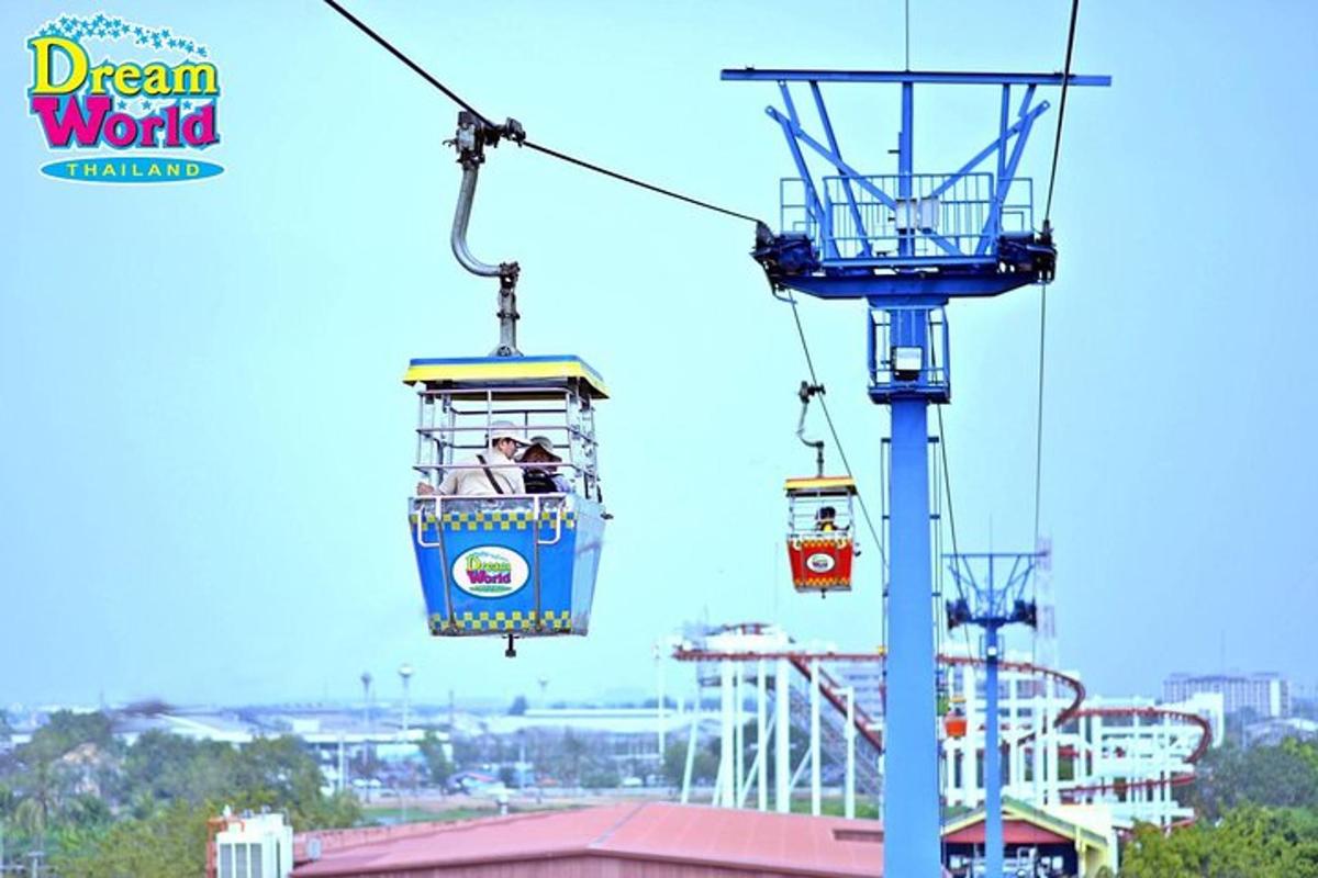 two gondolas on a cable car at a theme park