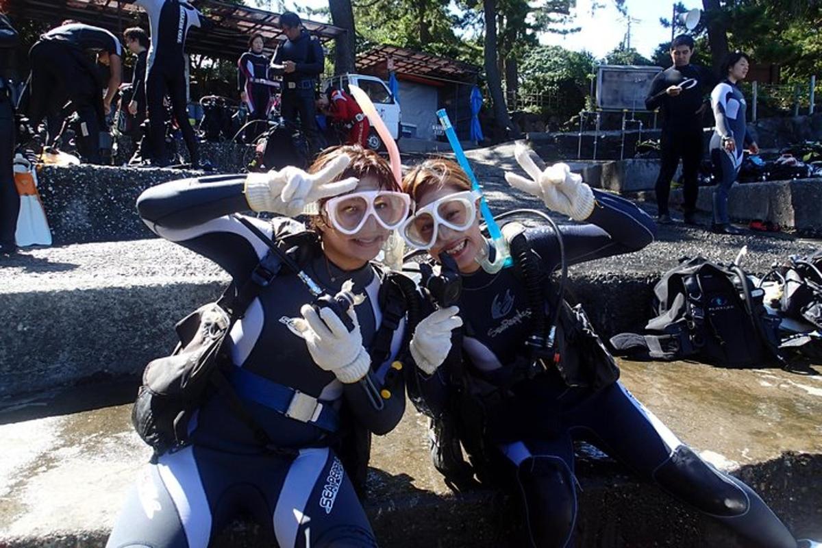 two women dressed in costumes posing for a picture