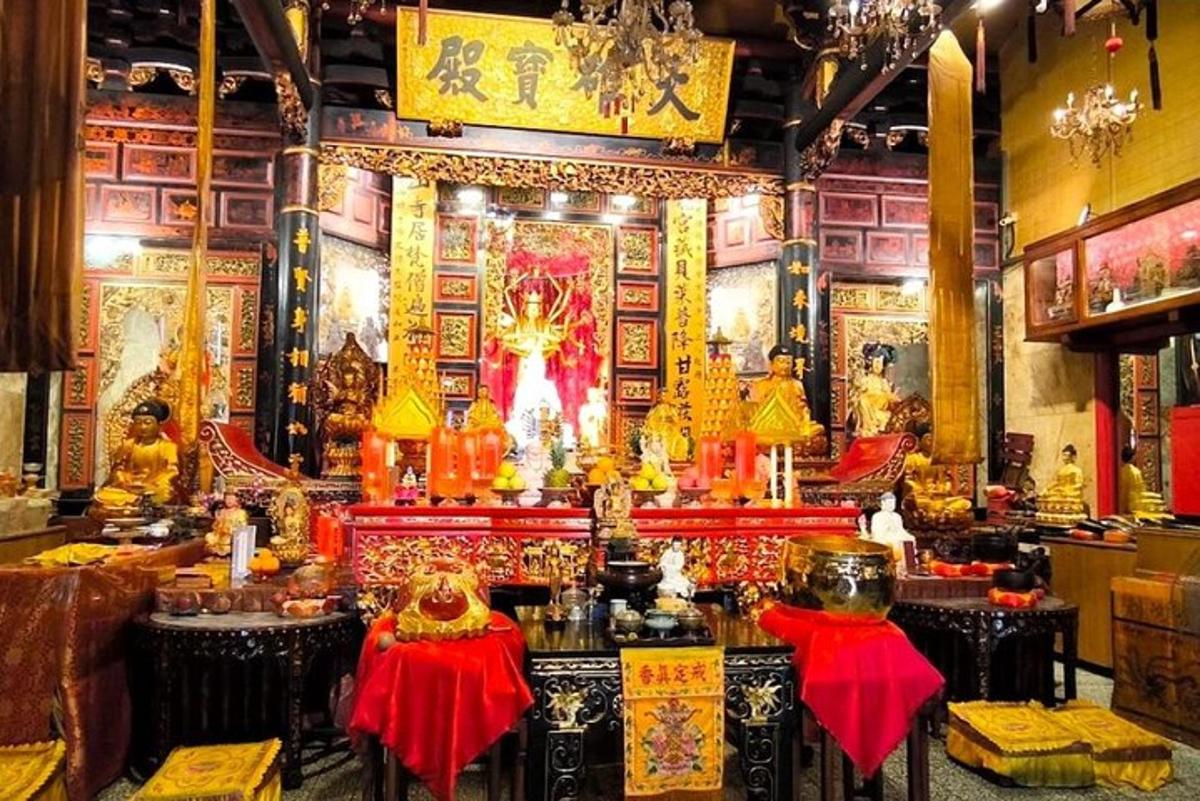 a chinese temple with a altar in a room