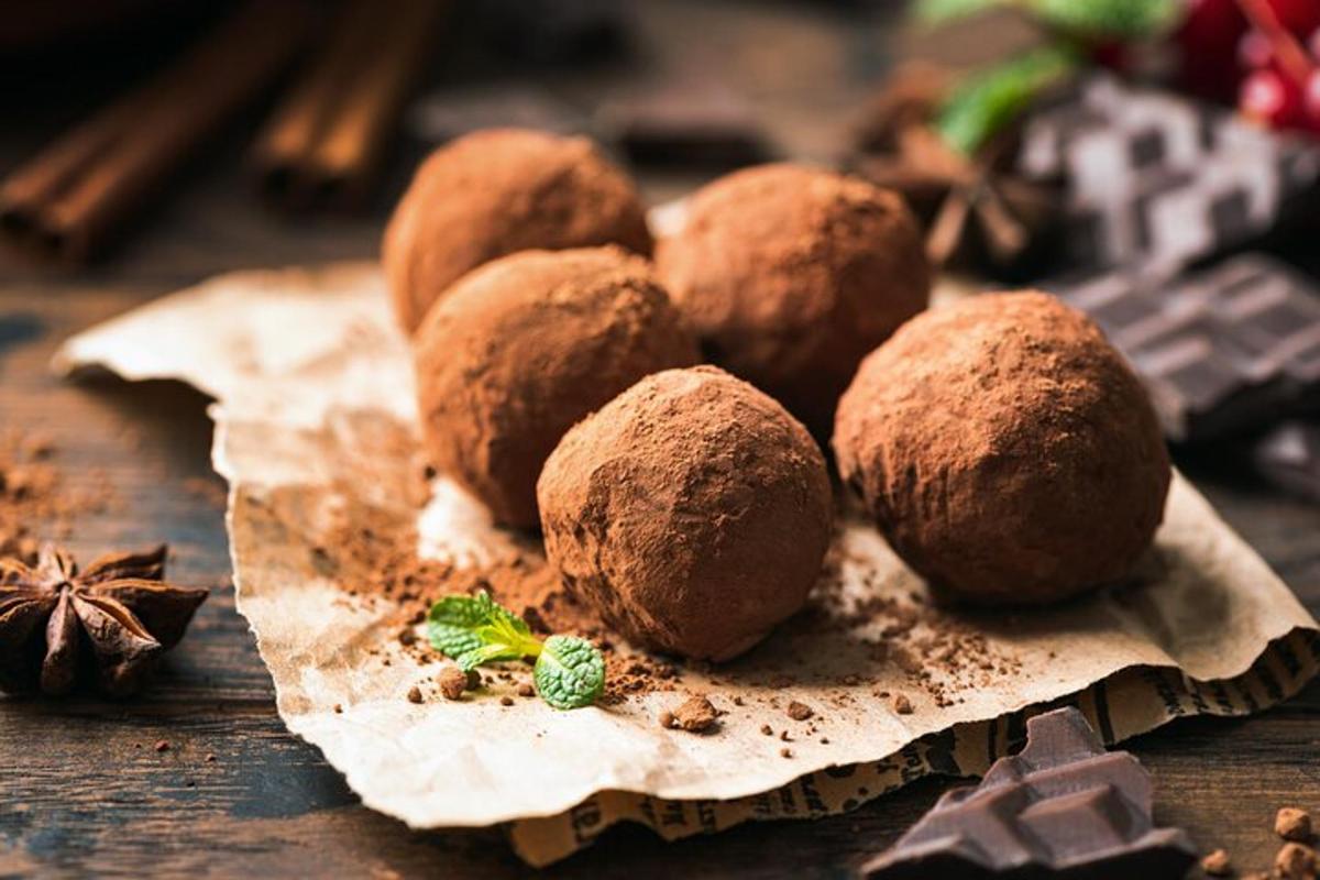 a pile of chocolate truffles on a table