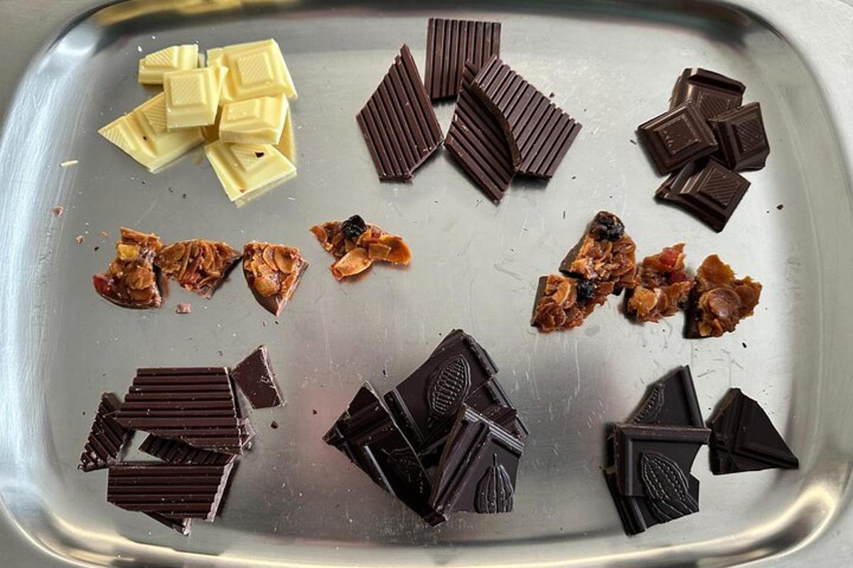 a plate of chocolate and other desserts on a table