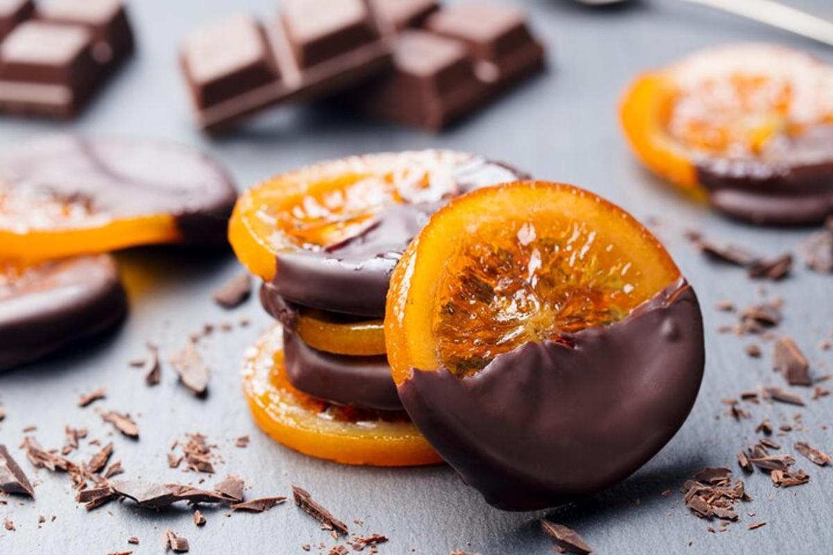 a group of chocolate cookies with an orange slice