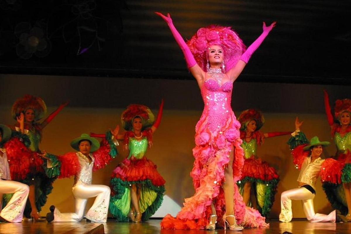 a group of women in colorful costumes on a stage