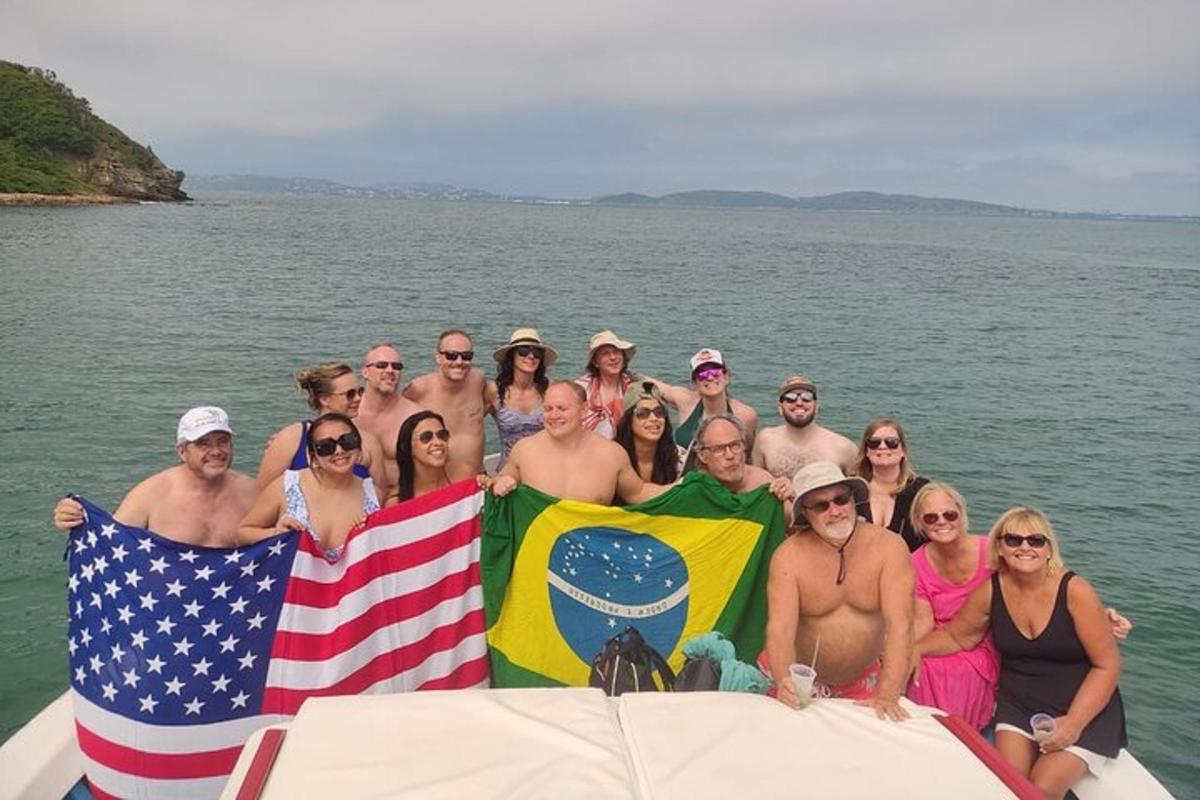 a group of people on a boat with flags