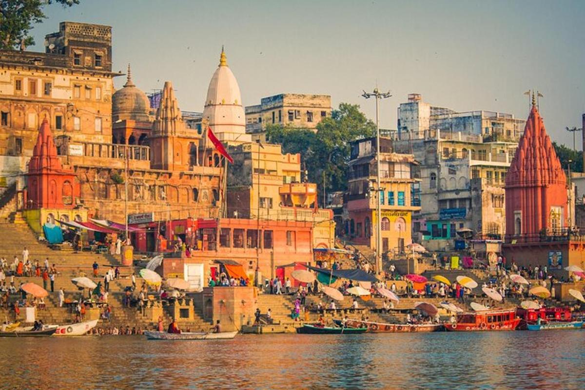 a group of buildings next to a body of water