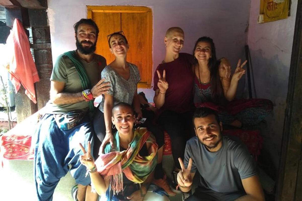 a group of people posing for a picture in a room