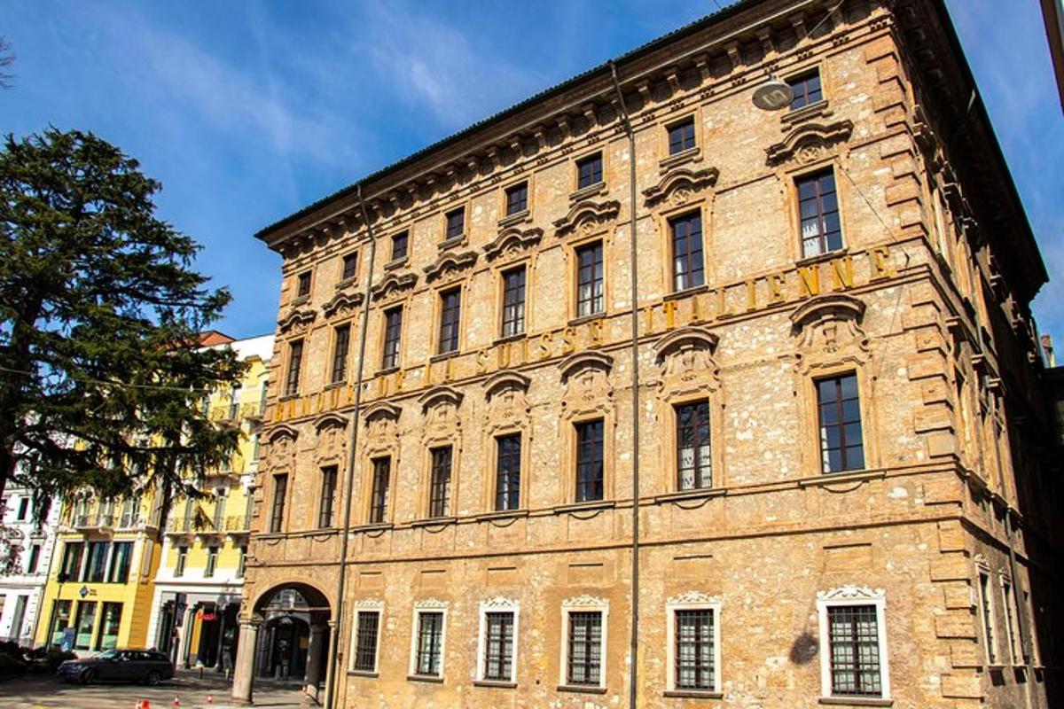 a large brick building with a clock on it