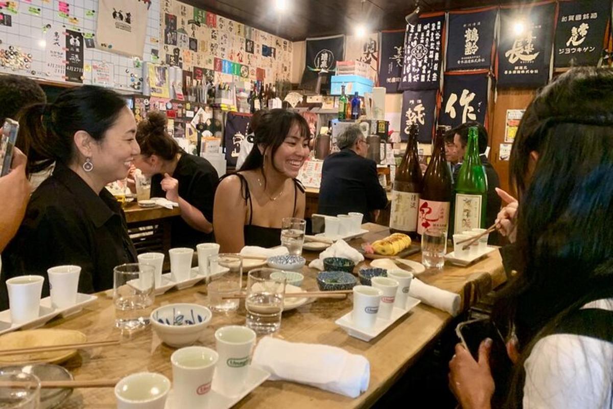 a group of women sitting at a table in a restaurant