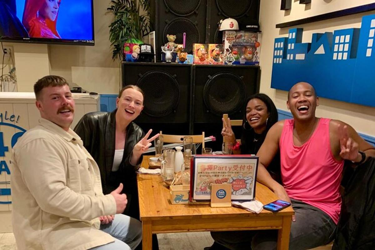 a group of people sitting around a table