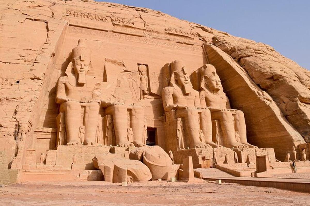 a large building with statues on the side of it