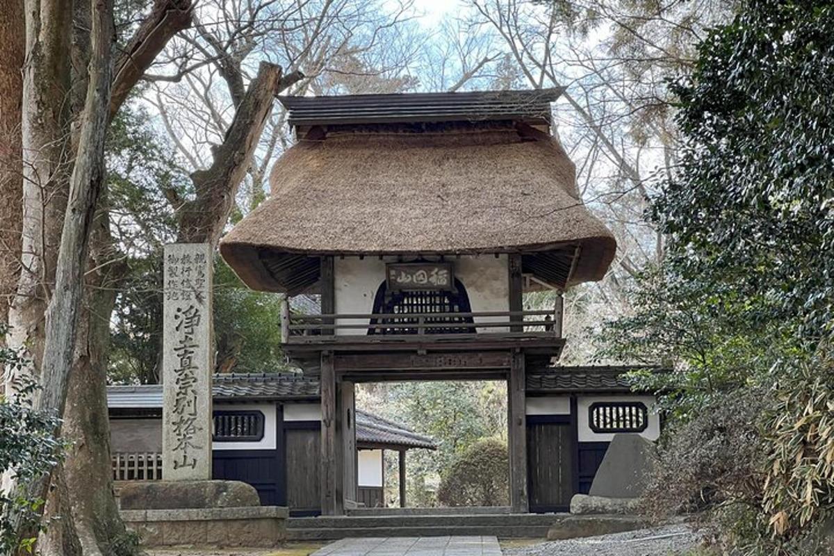 a gate to a building with a roof