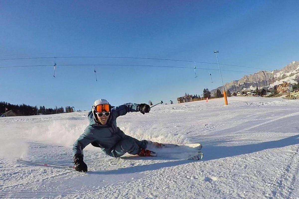 a person on skis falling down in the snow