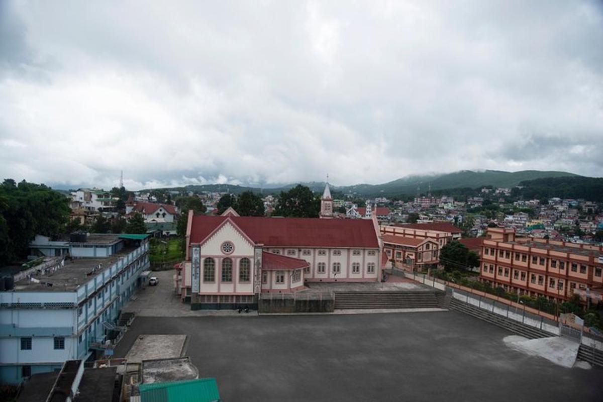 a view of a city with a large building