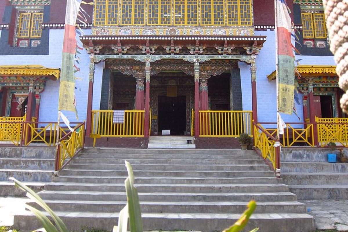 a building with stairs leading up to a doorway