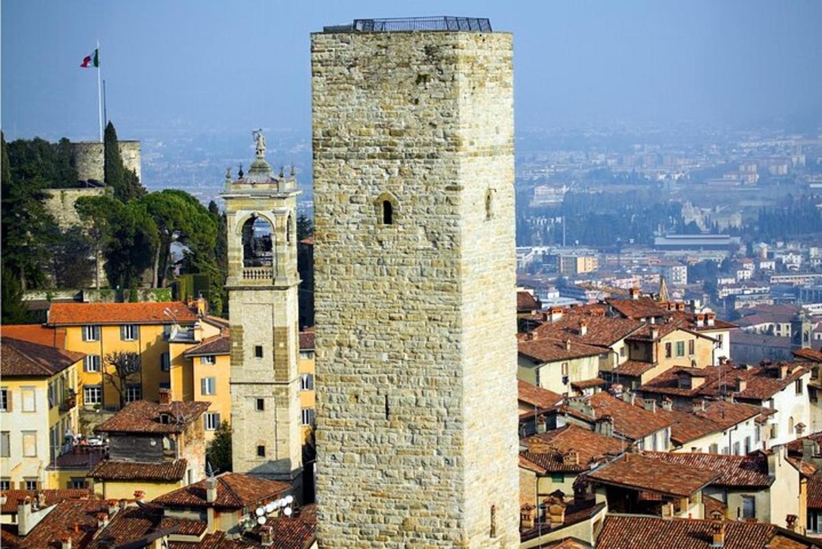 a tall building with a clock tower in a city