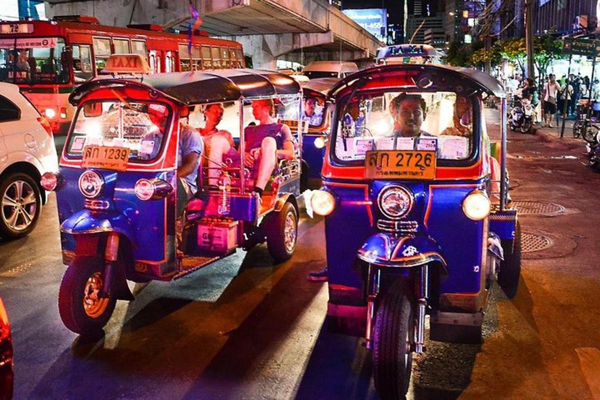 a group of people riding on the back of motorcycles