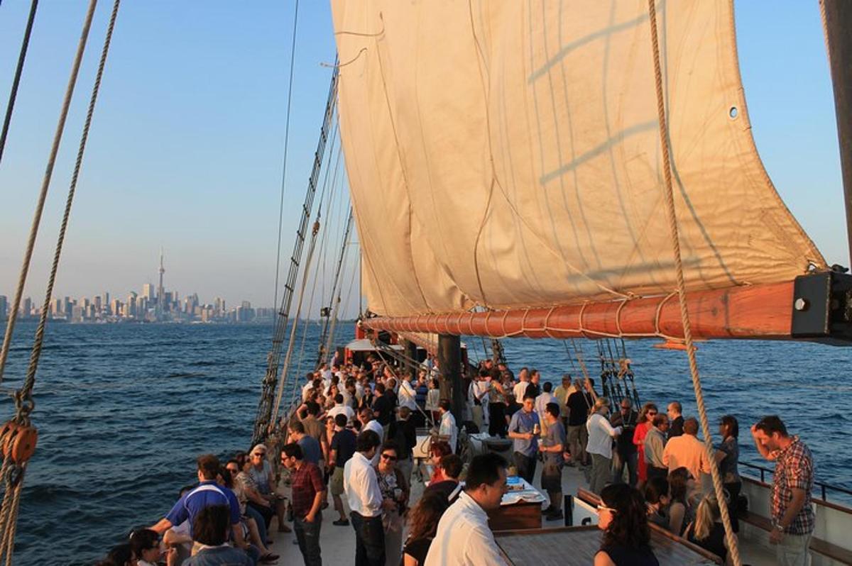 a group of people on a boat in the water