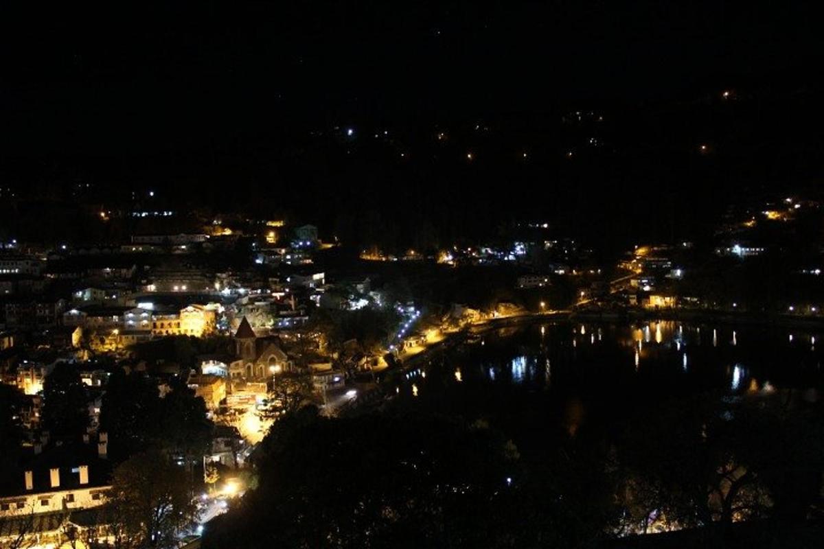 a view of a city at night with lights
