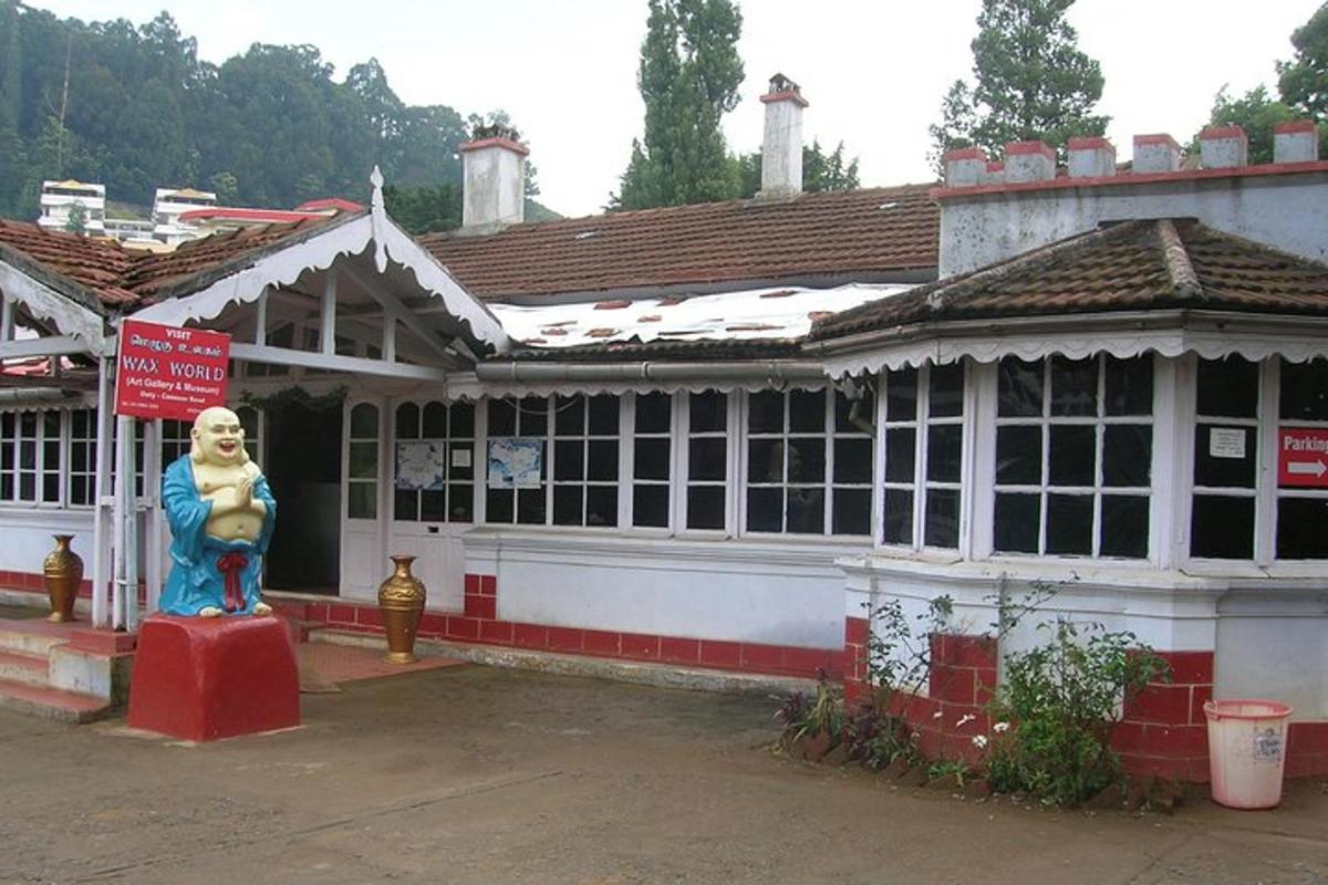 a statue of a woman in front of a building