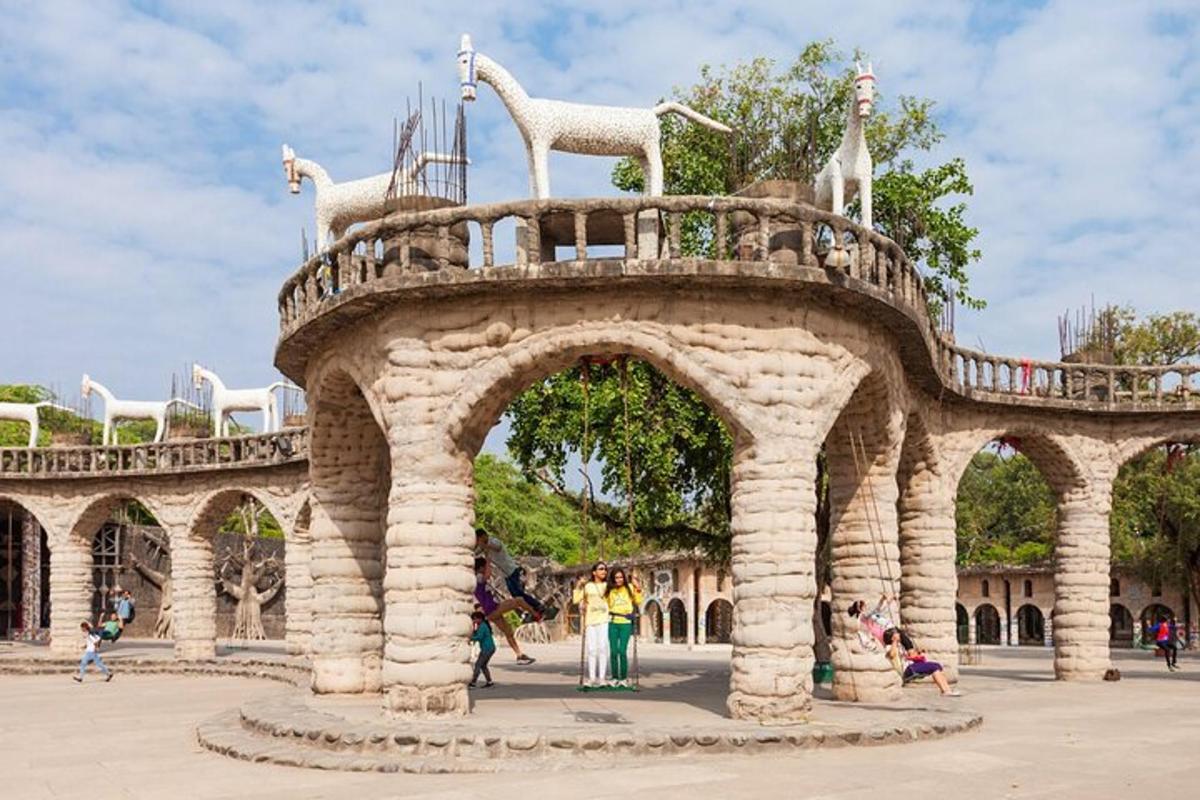 a building with an arch with animals on top of it