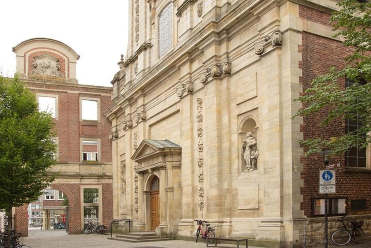 a building with a statue on the side of it