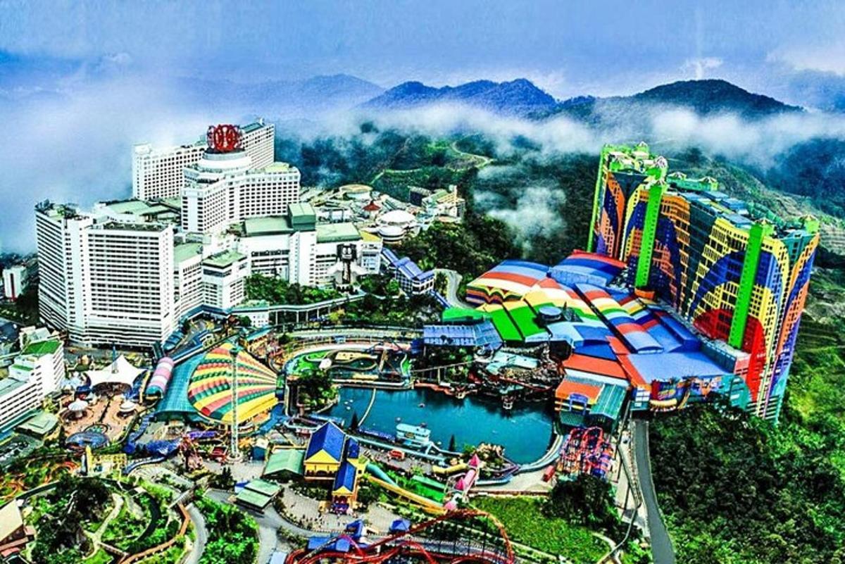 an aerial view of a water park with a roller coaster