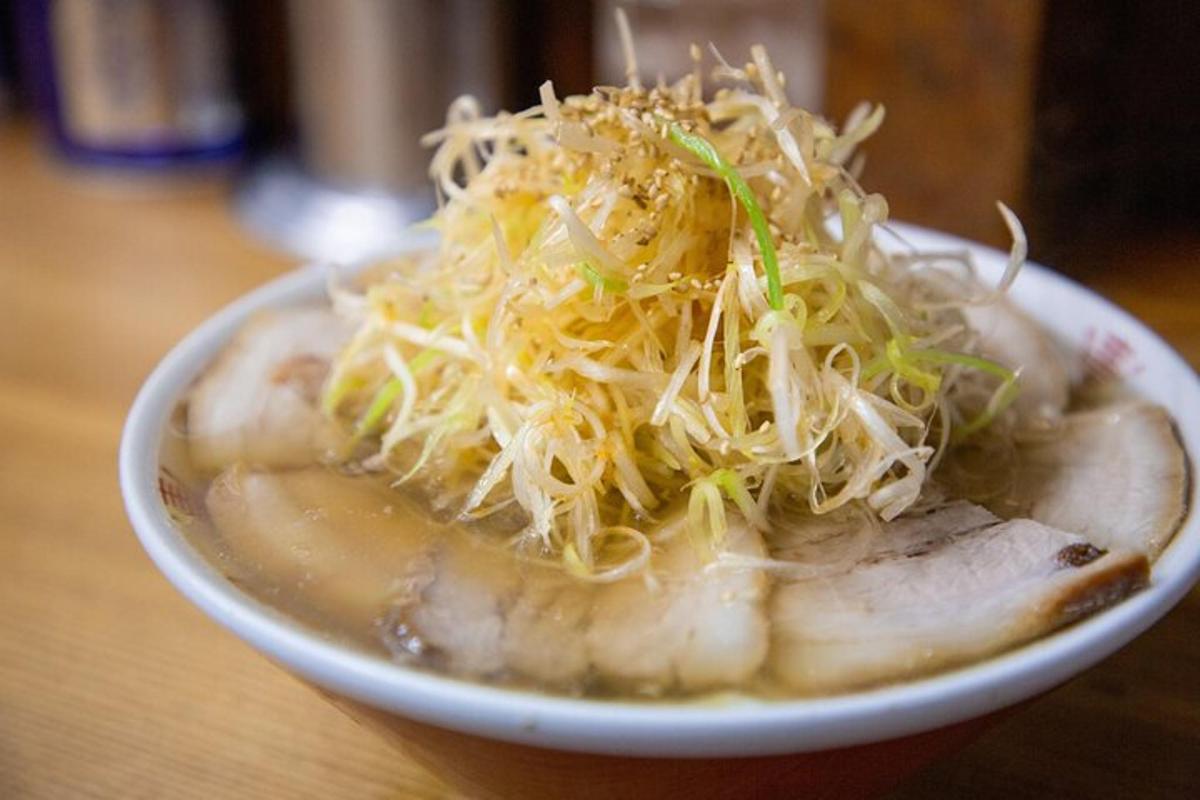 a plate of food with noodles on a table