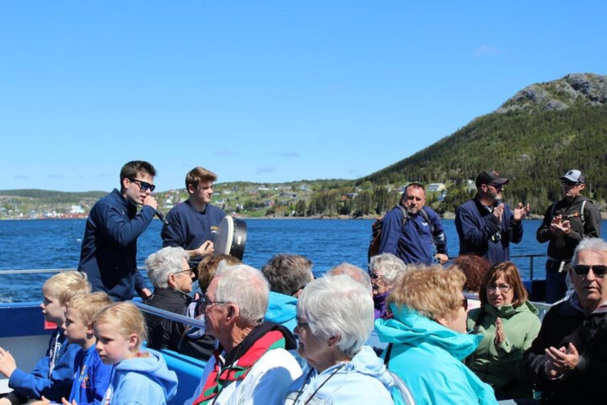 a group of people on a boat in the water