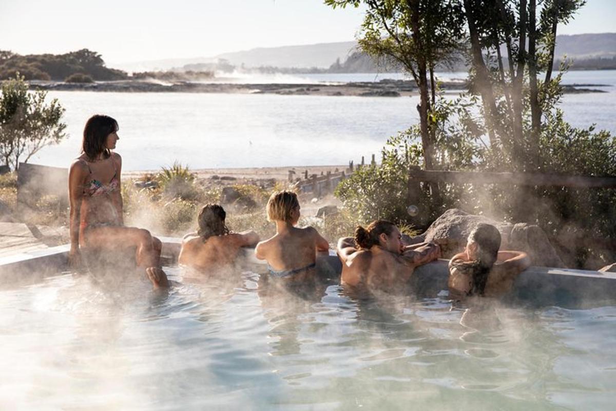 a group of people in a hot tub with water