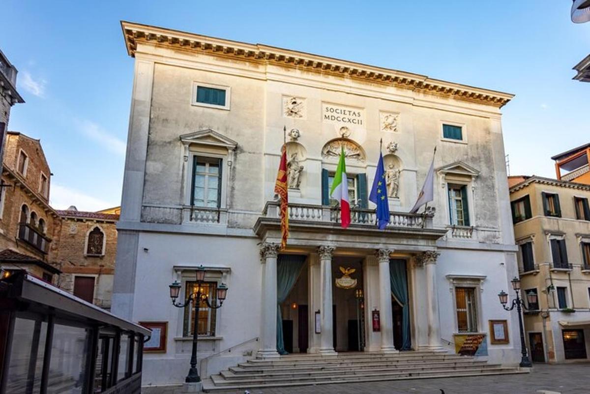 a building with flags on the front of it