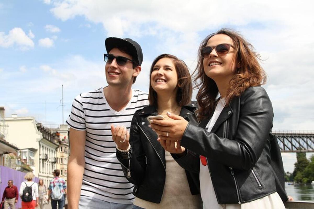 a man and two women standing next to each other