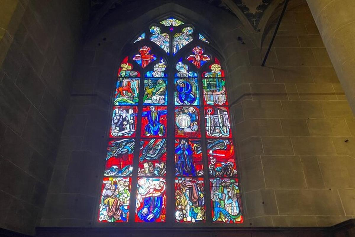 a large stained glass window in a church