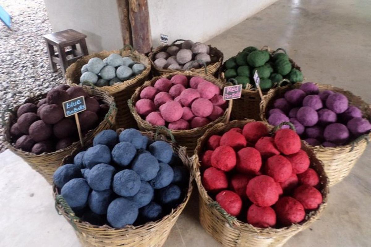a group of baskets filled with different colored candy
