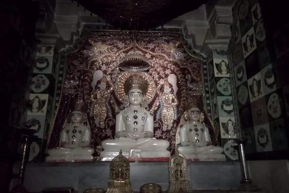 a statue of a goddess in a temple