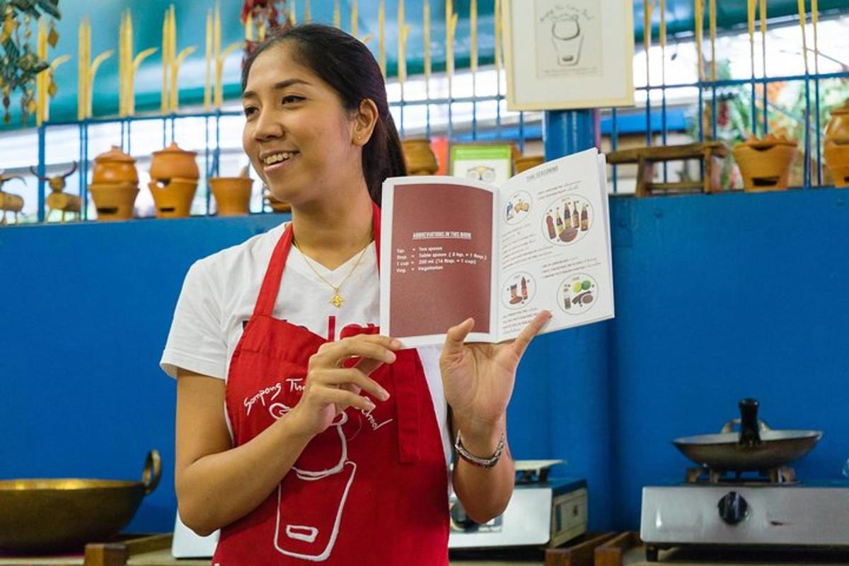 a woman in a store holding a book