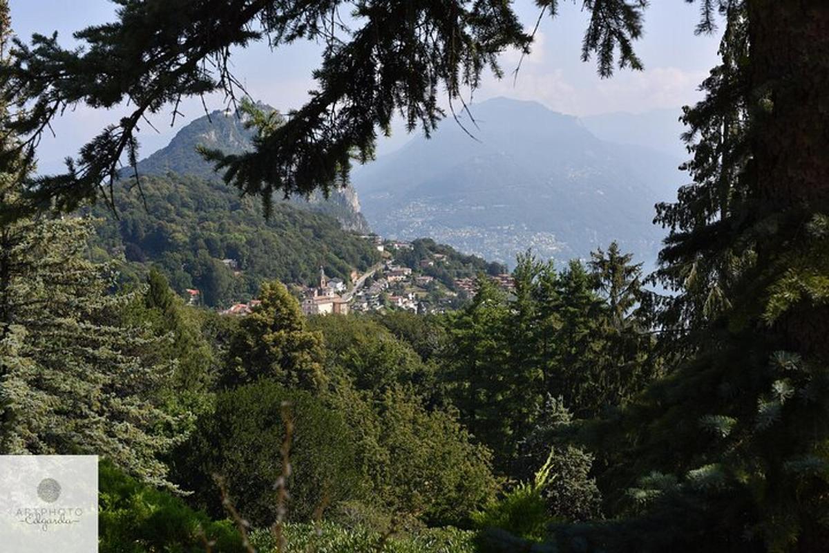 a view of a town in the middle of a mountain