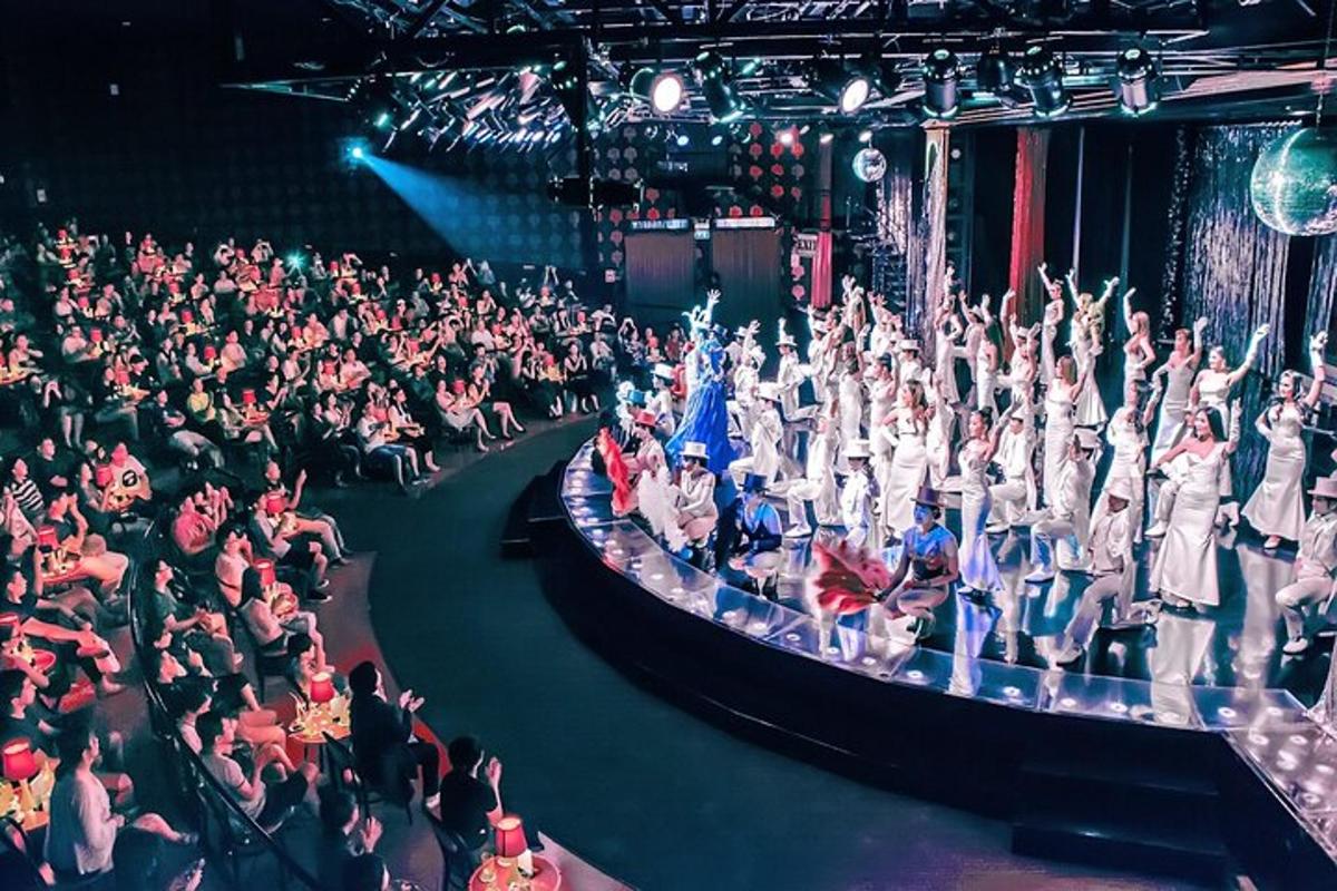 a large crowd of people sitting in an auditorium