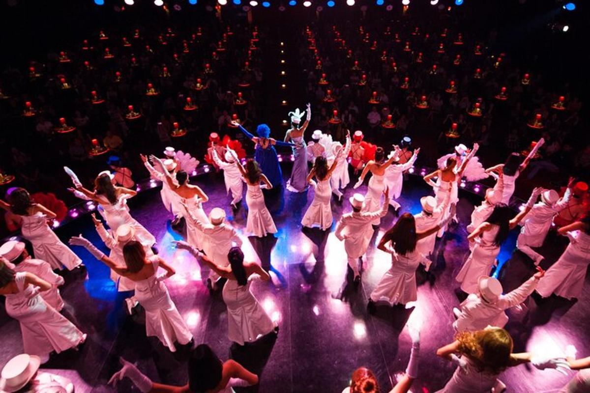 a group of people dancing on a stage