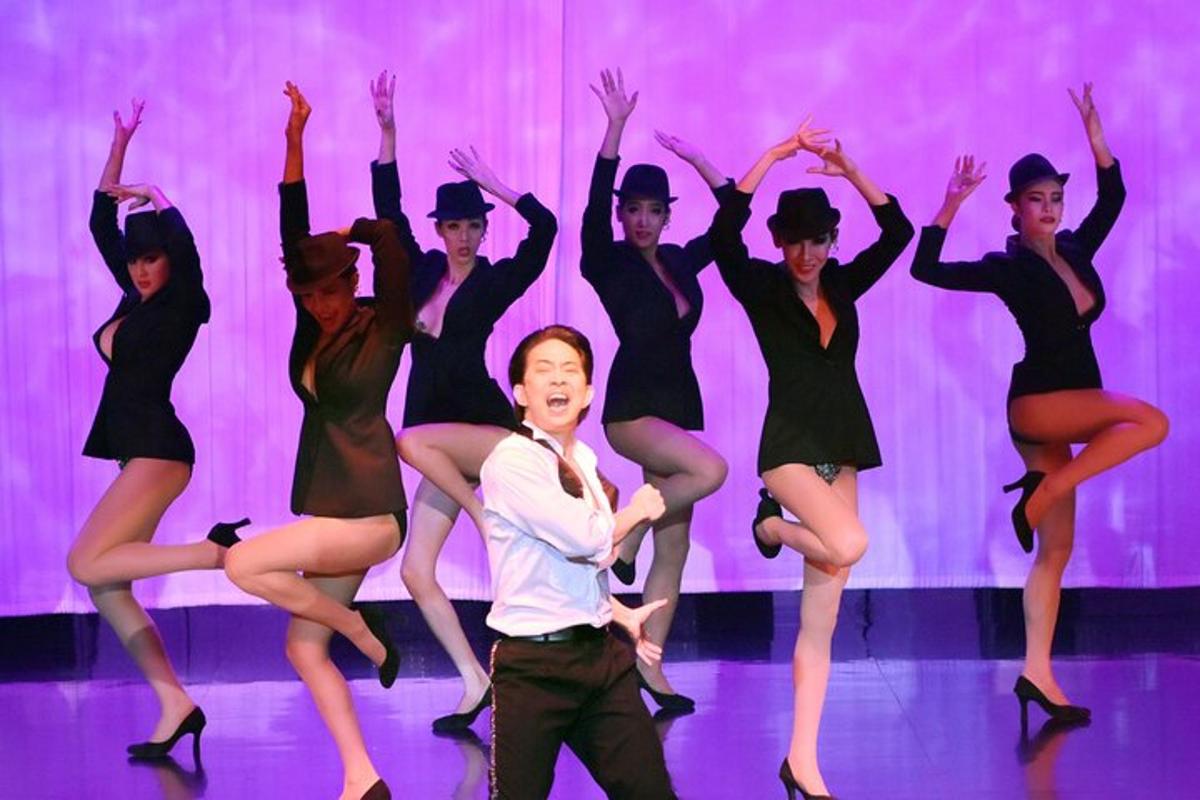 a group of young men ballet dancers on a stage