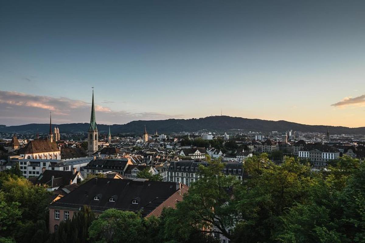 a view of a city with a tower in the distance
