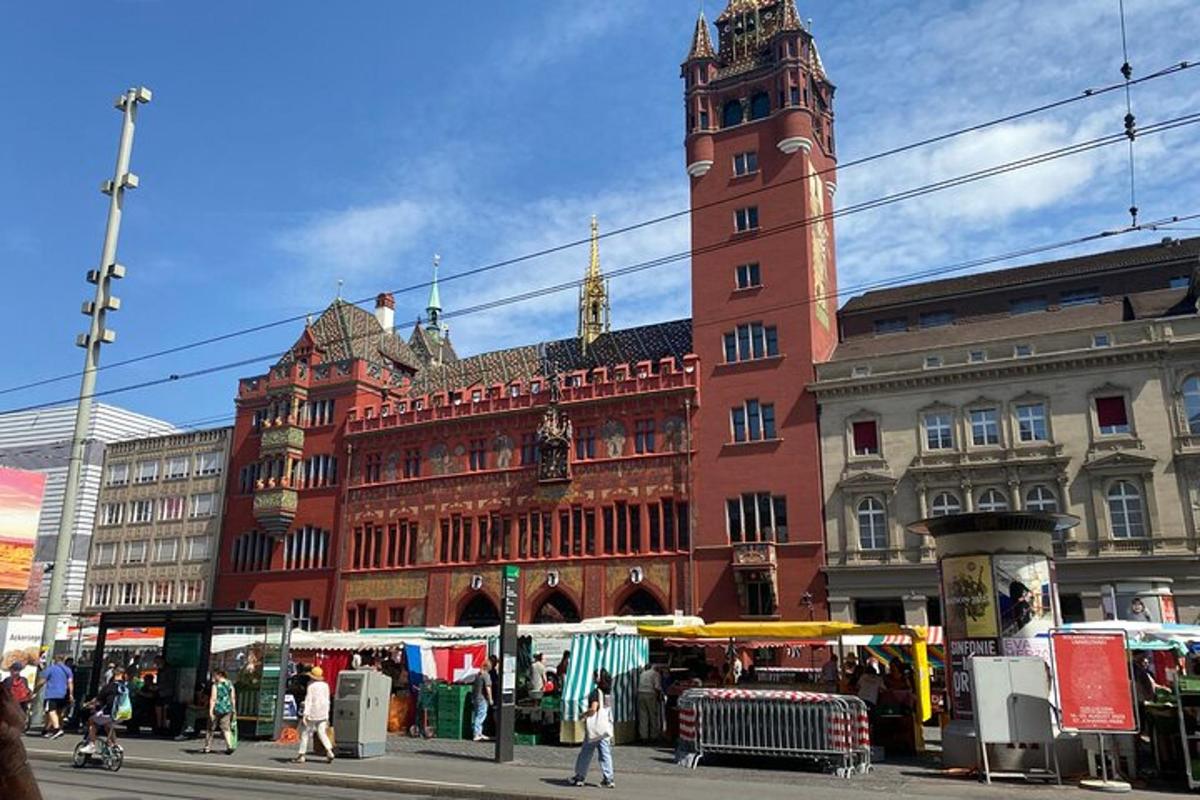 a large brick building with a clock tower on a street