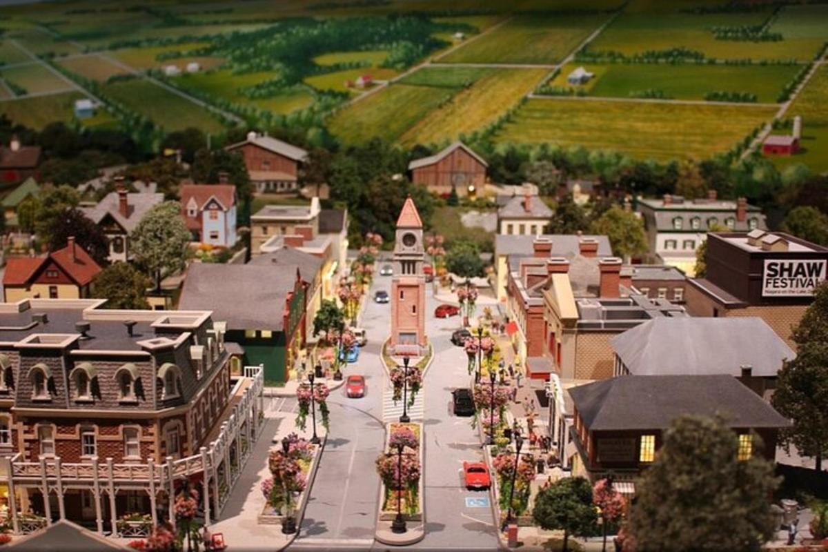 a model of a small town with cars on a street