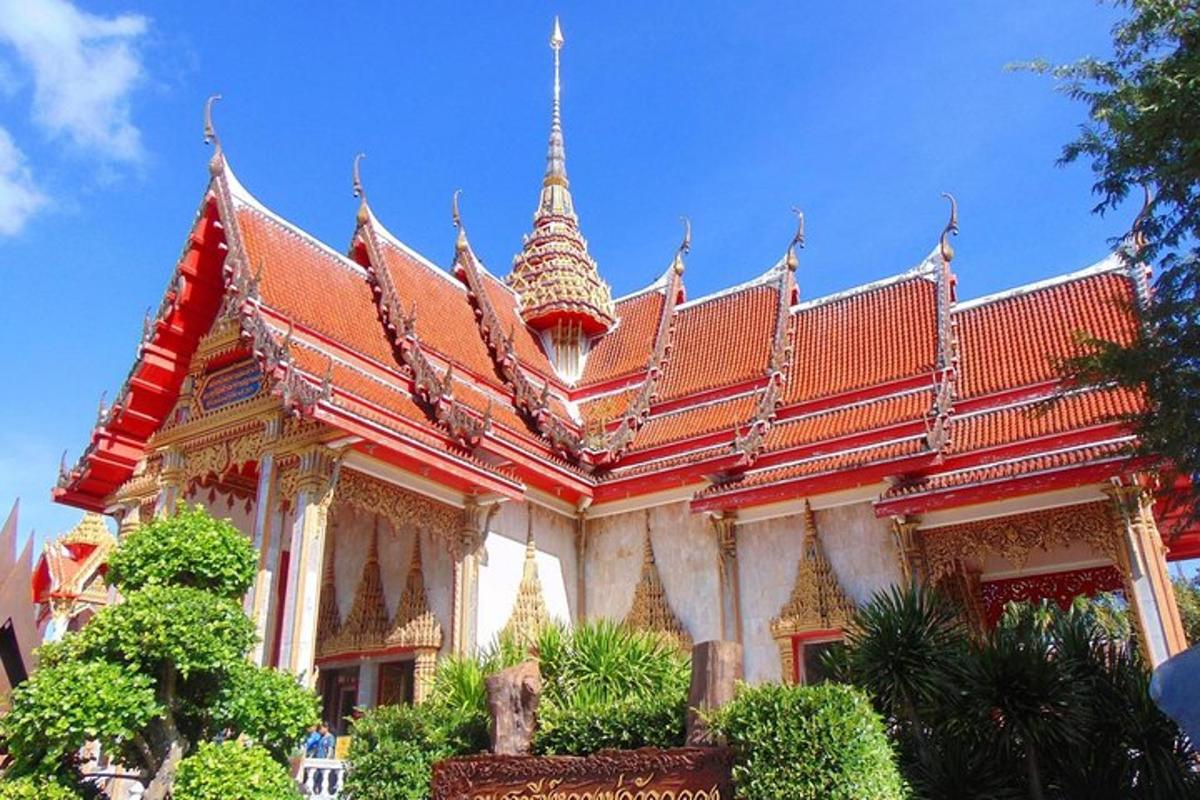 a building with a red and gold roof