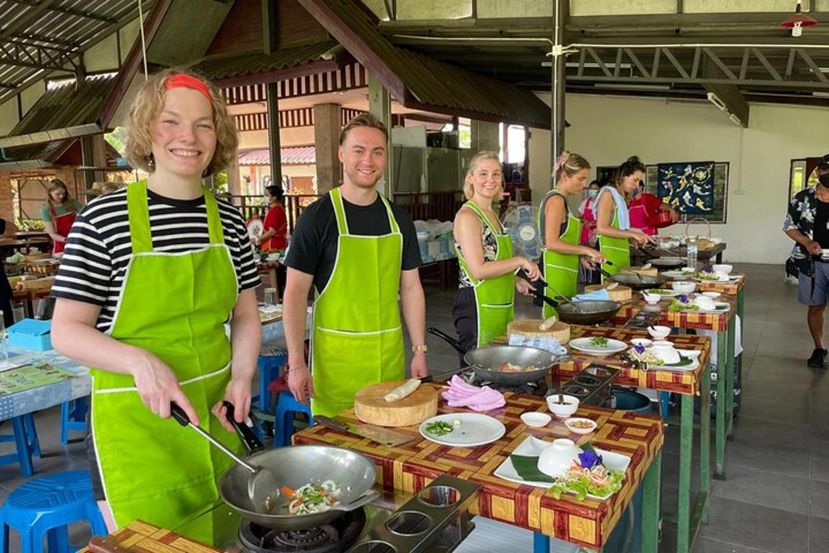 a group of people in a kitchen preparing food