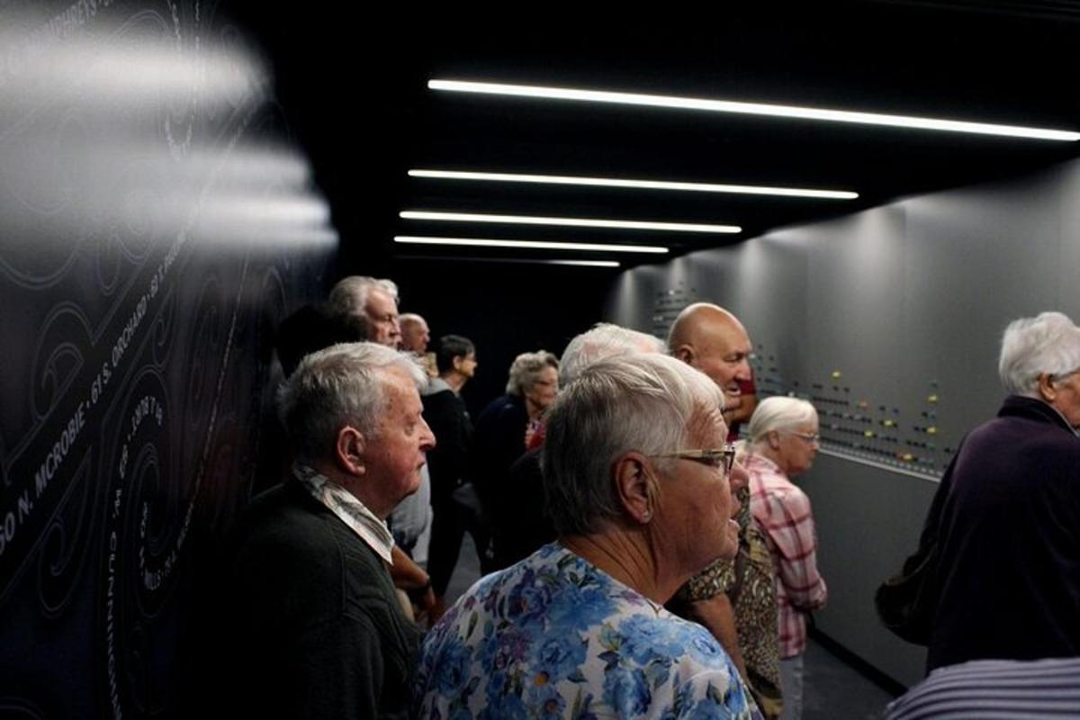 a group of people standing in a line
