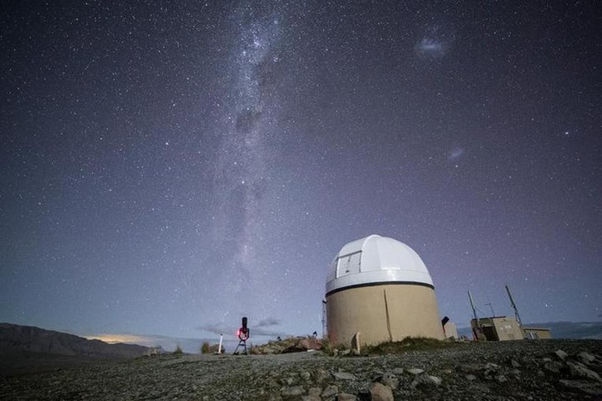 a observatory sitting on top of a hill at night