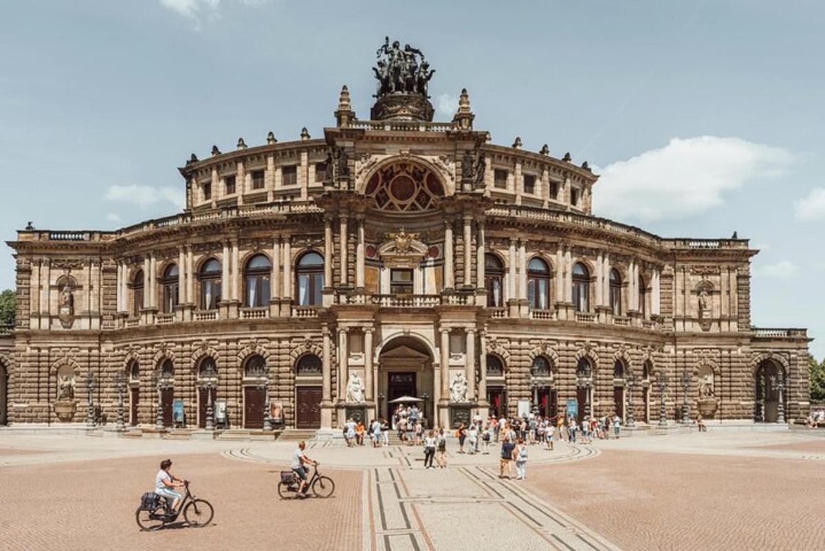 a large building with people in front of it