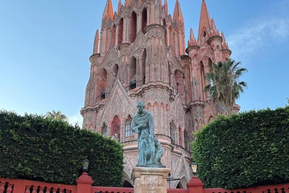 a statue of a woman in front of a building