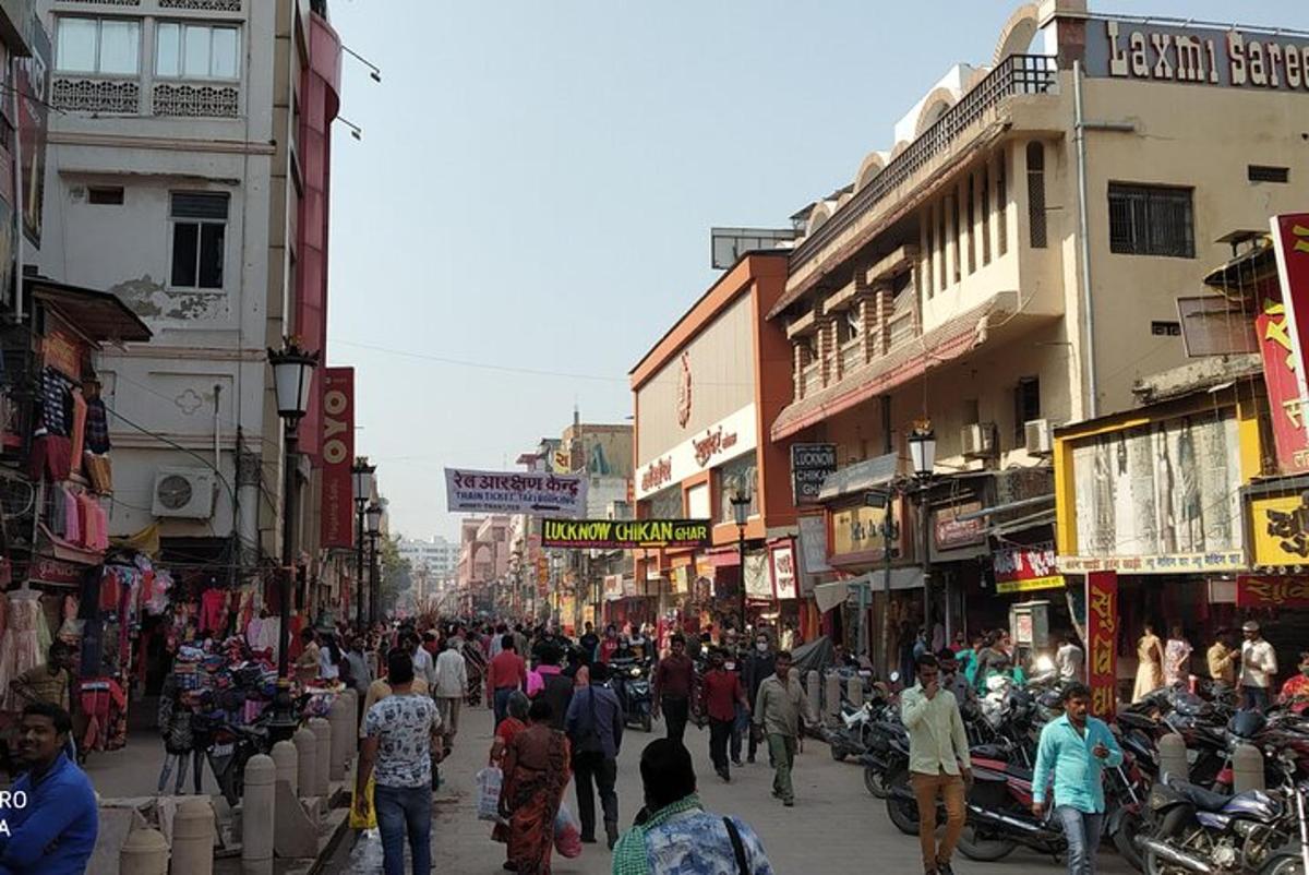 a group of people walking down a busy city street