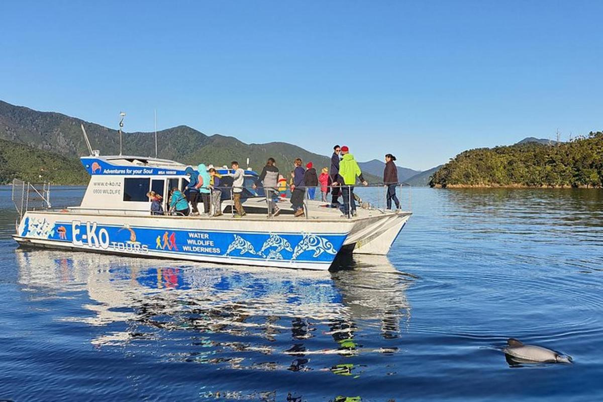 a group of people on a boat in the water